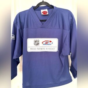 🌶️🌶️🌶️🌶️ Buy 2 or more T’s at $10 each 
Navy K-1 Hockey Shirt- NWOT